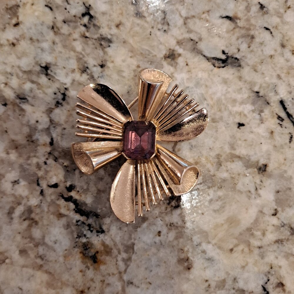Vintage Trifari Gold Tone Brooch with Purple Stone